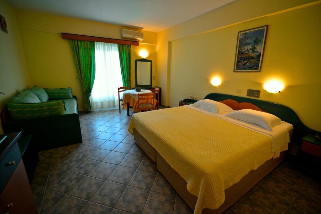 Hotel Odeon Vasilikí Rum bild