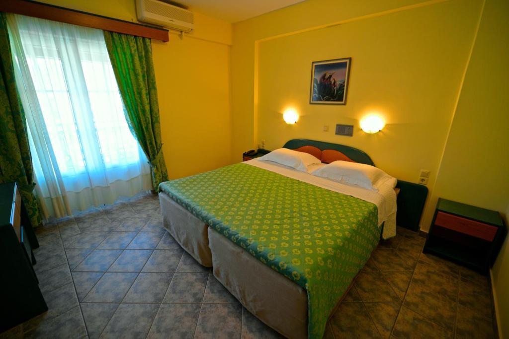 Hotel Odeon Vasilikí Rum bild